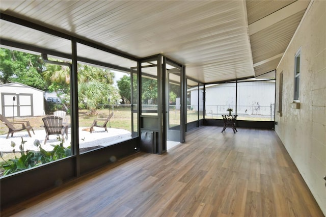sunroom featuring wood finished floors