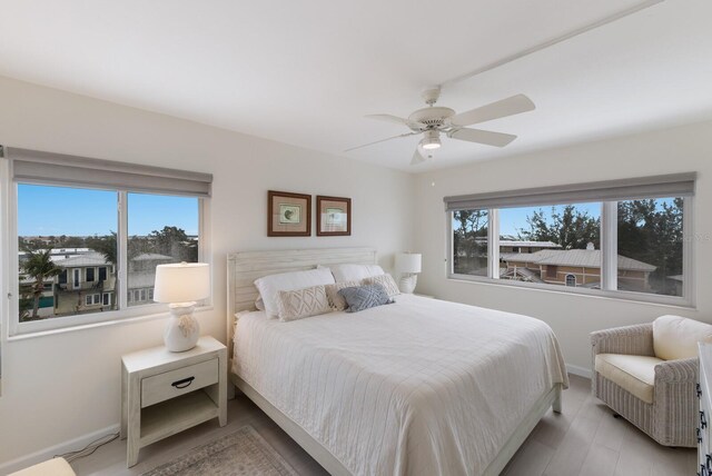5200 Gulf Dr Unit 408, Holmes Beach, FL 34217 - bedroom featuring baseboards and ceiling fan