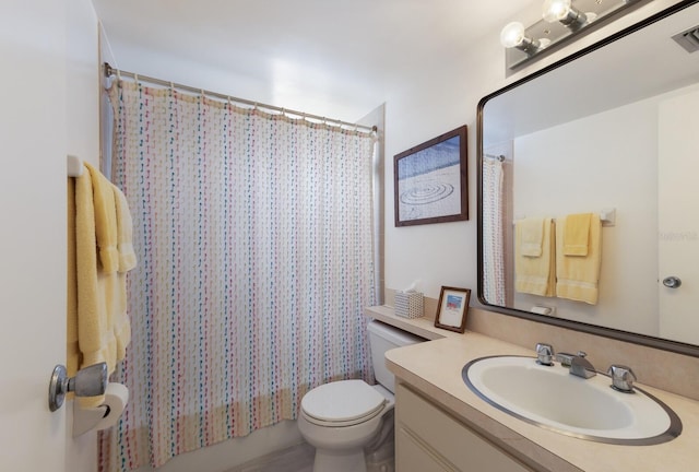5200 Gulf Dr Unit 408, Holmes Beach, FL 34217 - bathroom featuring toilet and vanity
