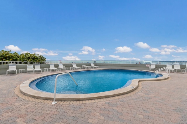5200 Gulf Dr Unit 408, Holmes Beach, FL 34217 - community pool featuring a patio