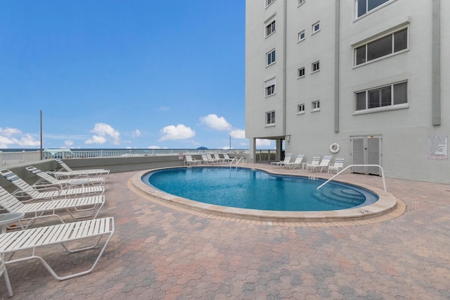 5200 Gulf Dr Unit 408, Holmes Beach, FL 34217 - community pool with a patio area