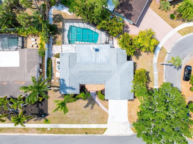 drone / aerial view of a pool