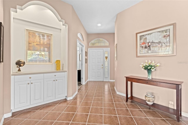 6764 Hickory Hammock Cir, Bradenton, FL 34202 - entryway with baseboards, tile patterned floors, and recessed lighting