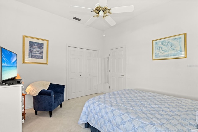 6764 Hickory Hammock Cir, Bradenton, FL 34202 - bedroom featuring light carpet, a closet, and ceiling fan