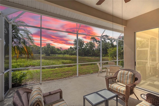 6764 Hickory Hammock Cir, Bradenton, FL 34202 - sunroom featuring a ceiling fan