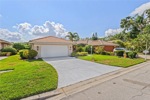 6764 Hickory Hammock Cir, Bradenton, FL 34202 - view of front facade featuring a front yard, a tiled roof, stucco siding, concrete driveway, and an attached garage