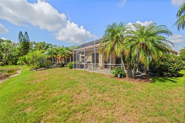 6764 Hickory Hammock Cir, Bradenton, FL 34202 - view of grassy yard featuring a lanai