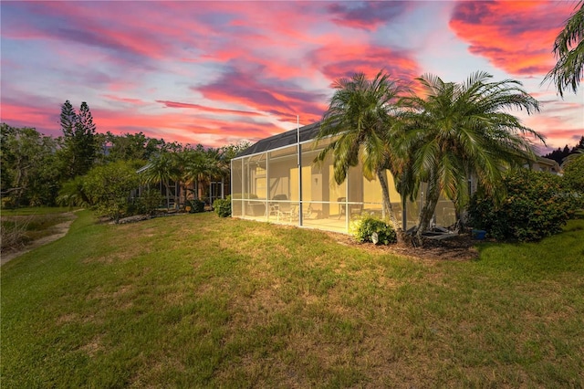 6764 Hickory Hammock Cir, Bradenton, FL 34202 - view of grassy yard featuring glass enclosure