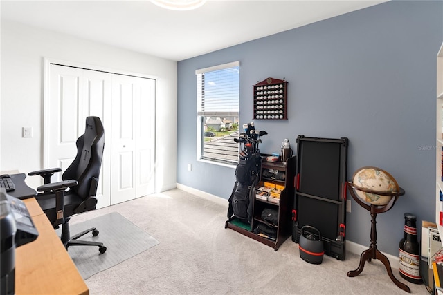 office area featuring carpet and baseboards