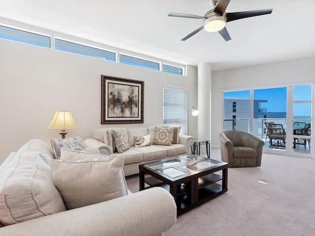 6512 Midnight Pass Rd Unit 303, Sarasota, FL 34242 - living area featuring a ceiling fan and carpet flooring