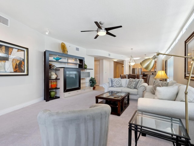 6512 Midnight Pass Rd Unit 303, Sarasota, FL 34242 - living room with carpet, ceiling fan, and baseboards