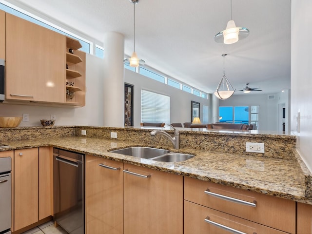 6512 Midnight Pass Rd Unit 303, Sarasota, FL 34242 - kitchen with a sink, appliances with stainless steel finishes, light stone counters, ceiling fan, and pendant lighting