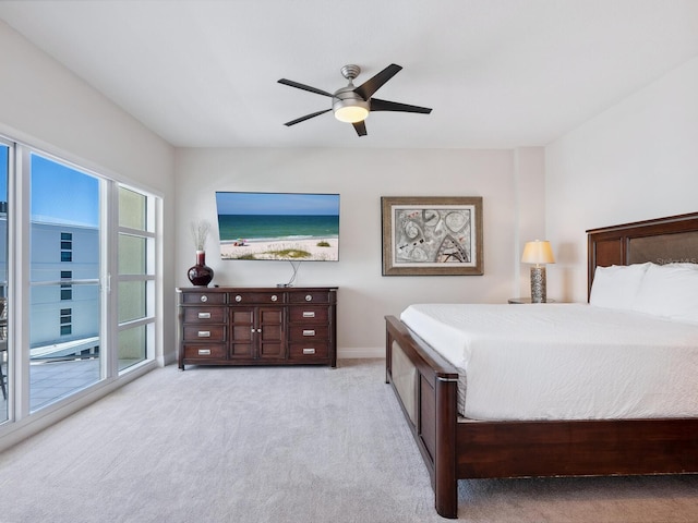 6512 Midnight Pass Rd Unit 303, Sarasota, FL 34242 - carpeted bedroom with baseboards and a ceiling fan