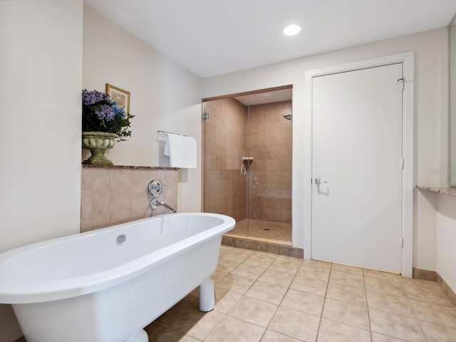 6512 Midnight Pass Rd Unit 303, Sarasota, FL 34242 - full bathroom featuring a stall shower, tile patterned floors, a freestanding tub, and recessed lighting