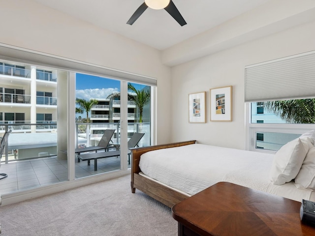 6512 Midnight Pass Rd Unit 303, Sarasota, FL 34242 - bedroom featuring carpet, access to exterior, and ceiling fan