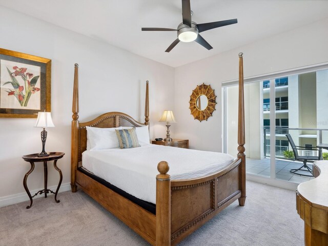 6512 Midnight Pass Rd Unit 303, Sarasota, FL 34242 - bedroom featuring light carpet, access to exterior, and a ceiling fan