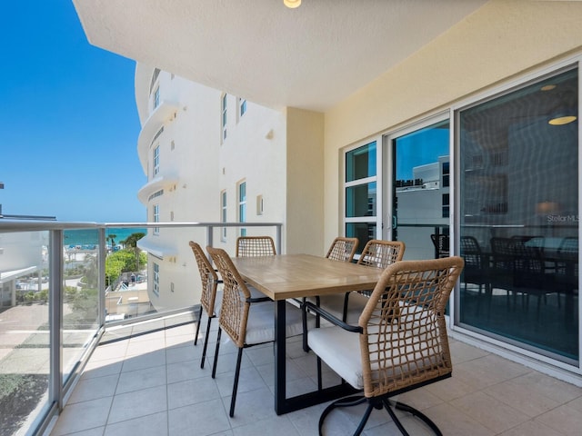 6512 Midnight Pass Rd Unit 303, Sarasota, FL 34242 - balcony with outdoor dining space