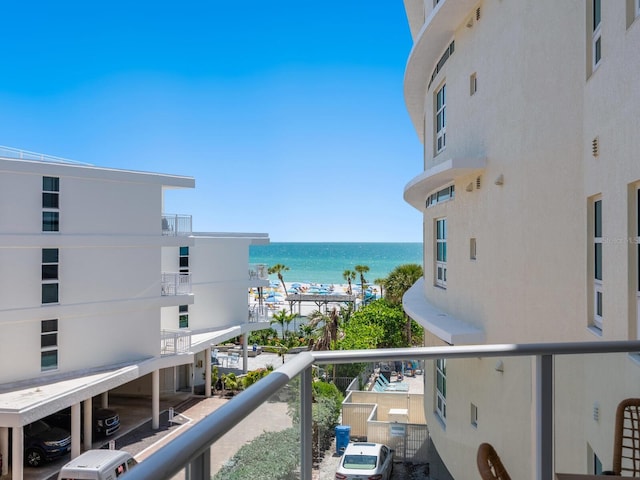 6512 Midnight Pass Rd Unit 303, Sarasota, FL 34242 - balcony featuring a water view