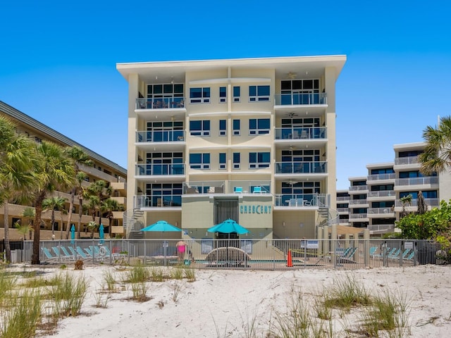 6512 Midnight Pass Rd Unit 303, Sarasota, FL 34242 - view of apartment building / complex with fence