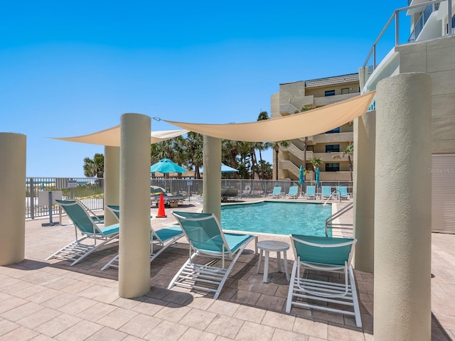 6512 Midnight Pass Rd Unit 303, Sarasota, FL 34242 - community pool featuring fence and a patio