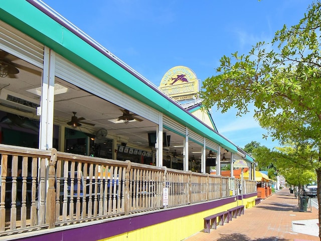 6512 Midnight Pass Rd Unit 303, Sarasota, FL 34242 - view of side of property featuring a ceiling fan
