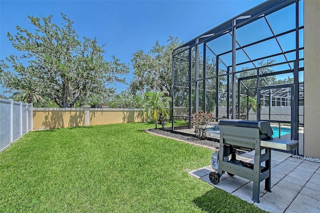 6605 38th Ln E, Sarasota, FL 34243 - view of yard with a patio and a lanai