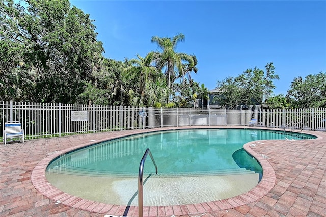 6605 38th Ln E, Sarasota, FL 34243 - community pool with a patio