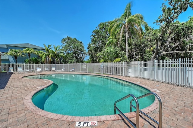 6605 38th Ln E, Sarasota, FL 34243 - community pool with a patio