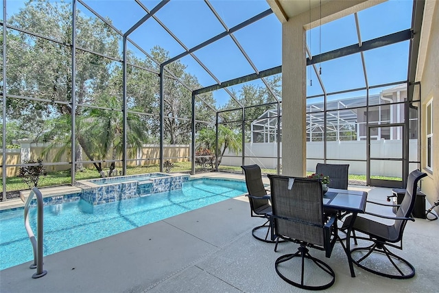 6605 38th Ln E, Sarasota, FL 34243 - view of swimming pool with a fenced backyard, a patio, a pool with connected hot tub, and glass enclosure