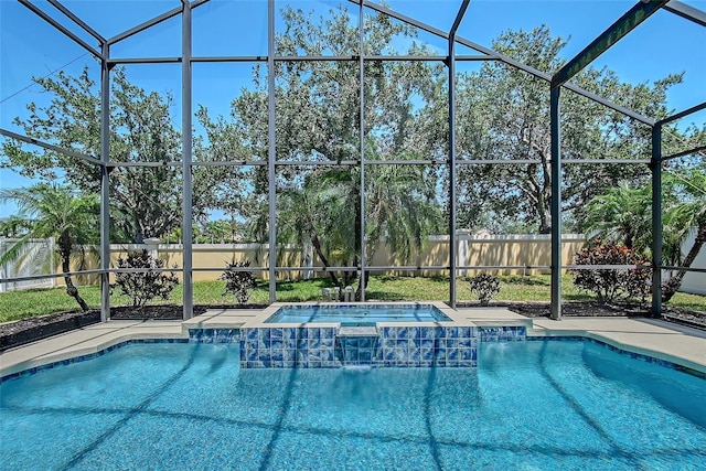6605 38th Ln E, Sarasota, FL 34243 - view of pool featuring a fenced backyard, glass enclosure, and a pool with connected hot tub