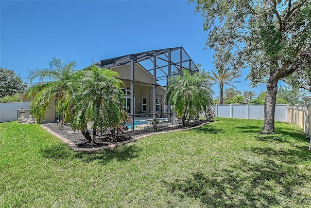 6605 38th Ln E, Sarasota, FL 34243 - rear view of property with a lanai and a patio area