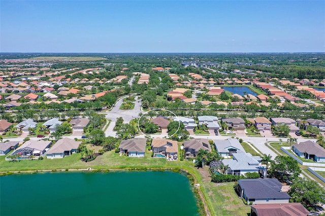 6605 38th Ln E, Sarasota, FL 34243 - aerial view of property and surrounding area featuring nearby suburban area and a large body of water