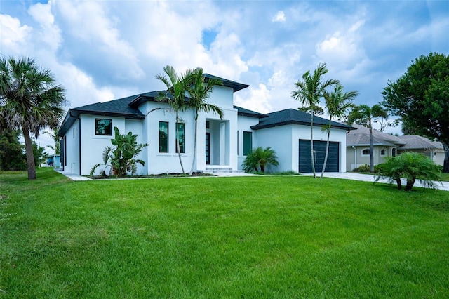 117 Marker Rd, Rotonda West, FL 33947 - view of front facade featuring stucco siding, a garage, and a front lawn