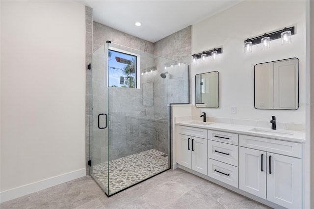 117 Marker Rd, Rotonda West, FL 33947 - full bathroom with a stall shower, double vanity, and baseboards