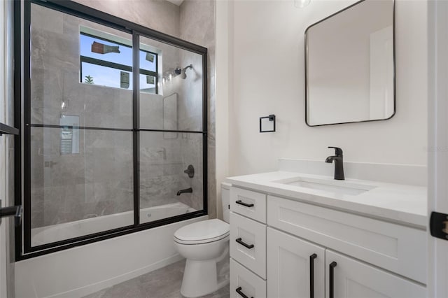 117 Marker Rd, Rotonda West, FL 33947 - full bathroom with toilet, vanity, and combined bath / shower with glass door