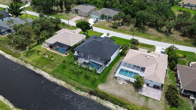 117 Marker Rd, Rotonda West, FL 33947 - aerial view of property's location featuring nearby suburban area, a pool area, and a nearby body of water