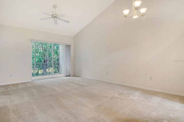 unfurnished room with a chandelier, light carpet, baseboards, high vaulted ceiling, and a ceiling fan