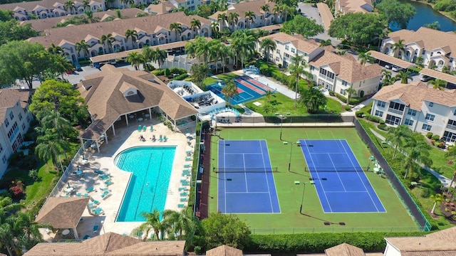 aerial perspective of suburban area with a pool