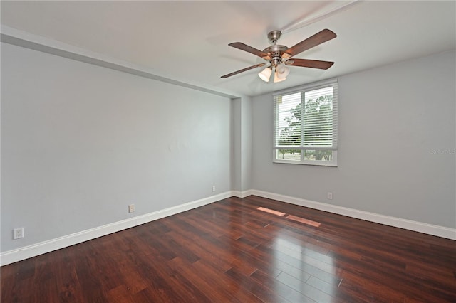 2901 26th St W Unit 312, Bradenton, FL 34205 - spare room featuring ceiling fan, dark wood-style flooring, and baseboards