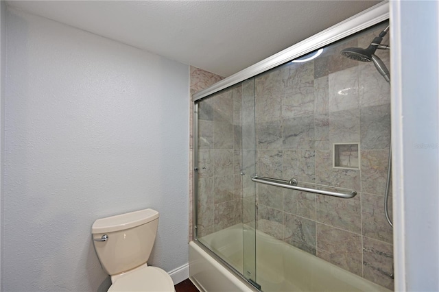 2901 26th St W Unit 312, Bradenton, FL 34205 - bathroom with shower / bath combination with glass door and toilet