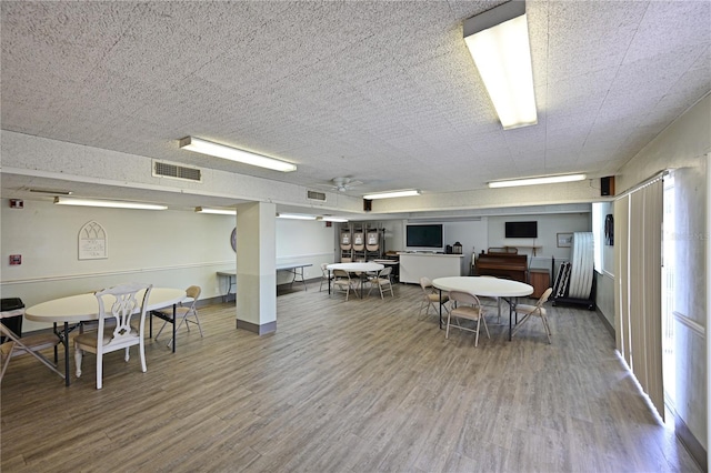 2901 26th St W Unit 312, Bradenton, FL 34205 - dining area featuring wood finished floors