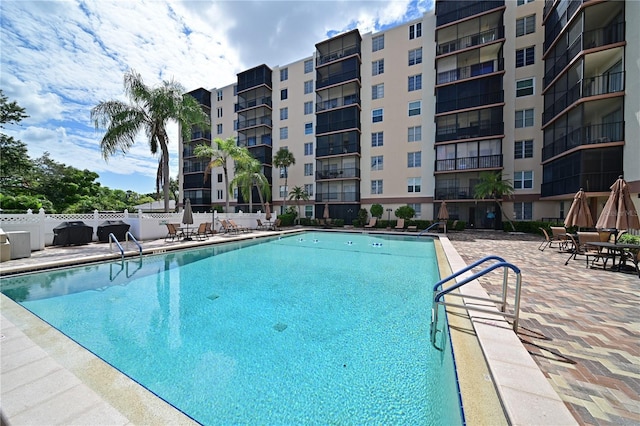 2901 26th St W Unit 312, Bradenton, FL 34205 - community pool featuring a patio area