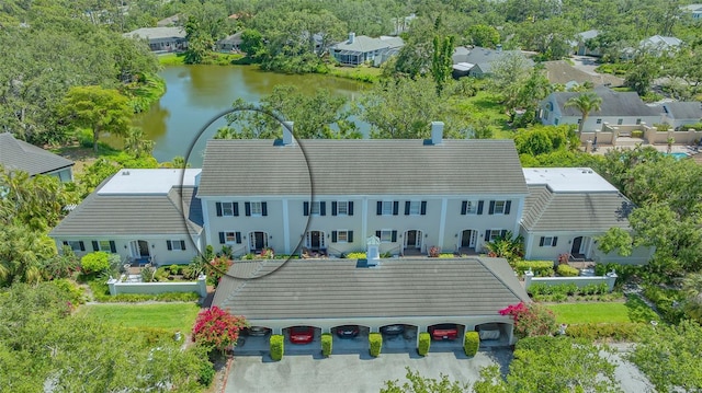 33 Bishops Court Rd Unit 118, Osprey, FL 34229 - view of subject property featuring a large body of water and a tree filled landscape