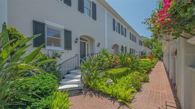 33 Bishops Court Rd Unit 118, Osprey, FL 34229 - doorway to property with stucco siding