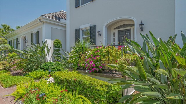 33 Bishops Court Rd Unit 118, Osprey, FL 34229 - doorway to property featuring stucco siding
