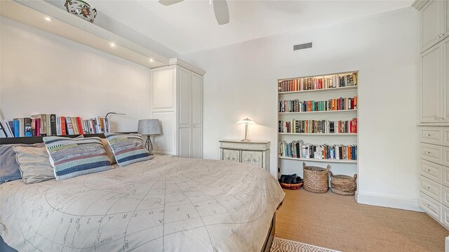 33 Bishops Court Rd Unit 118, Osprey, FL 34229 - carpeted bedroom featuring ceiling fan and baseboards