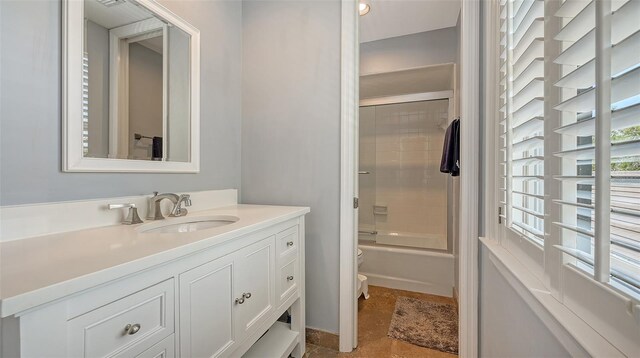 33 Bishops Court Rd Unit 118, Osprey, FL 34229 - full bath featuring vanity, toilet, and shower / washtub combination