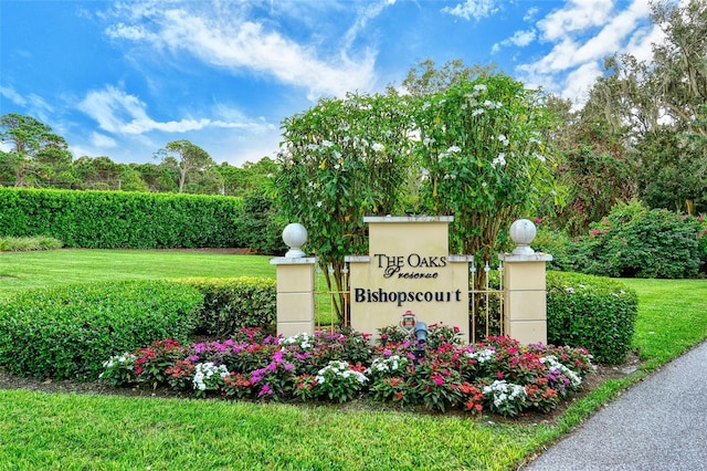 33 Bishops Court Rd Unit 118, Osprey, FL 34229 - community / neighborhood sign featuring a lawn