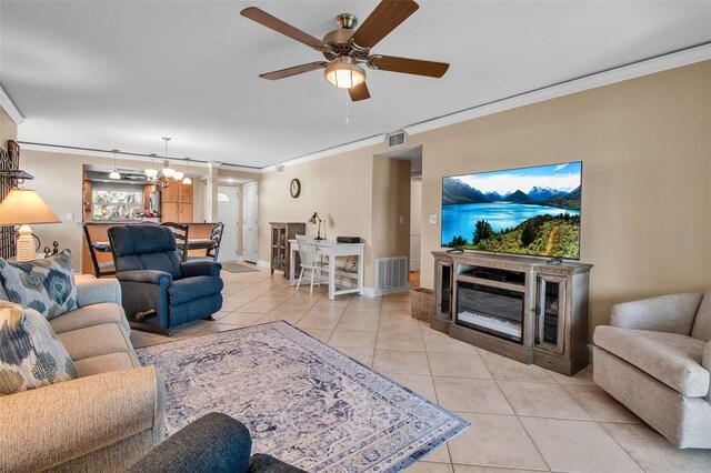 10423 Waterbird Way Unit 10423, Bradenton, FL 34209 - living area featuring ornamental molding, light tile patterned flooring, a chandelier, ceiling fan, and baseboards