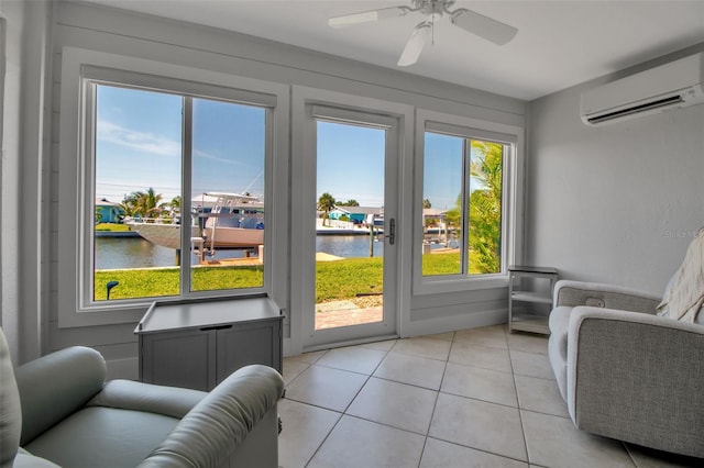 10423 Waterbird Way Unit 10423, Bradenton, FL 34209 - sunroom / solarium featuring an AC wall unit, a water view, and french doors